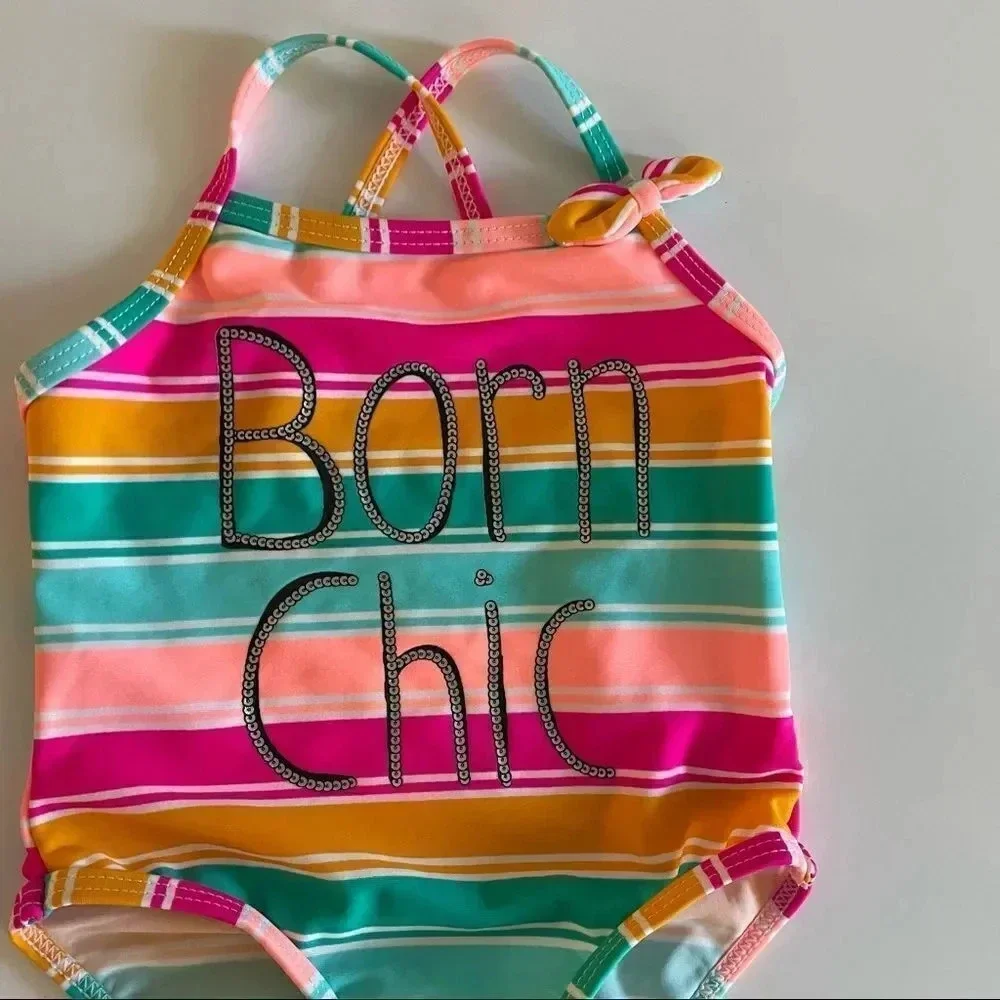 Koala Kids multi color bathing suit w/ “Born Chic” wording